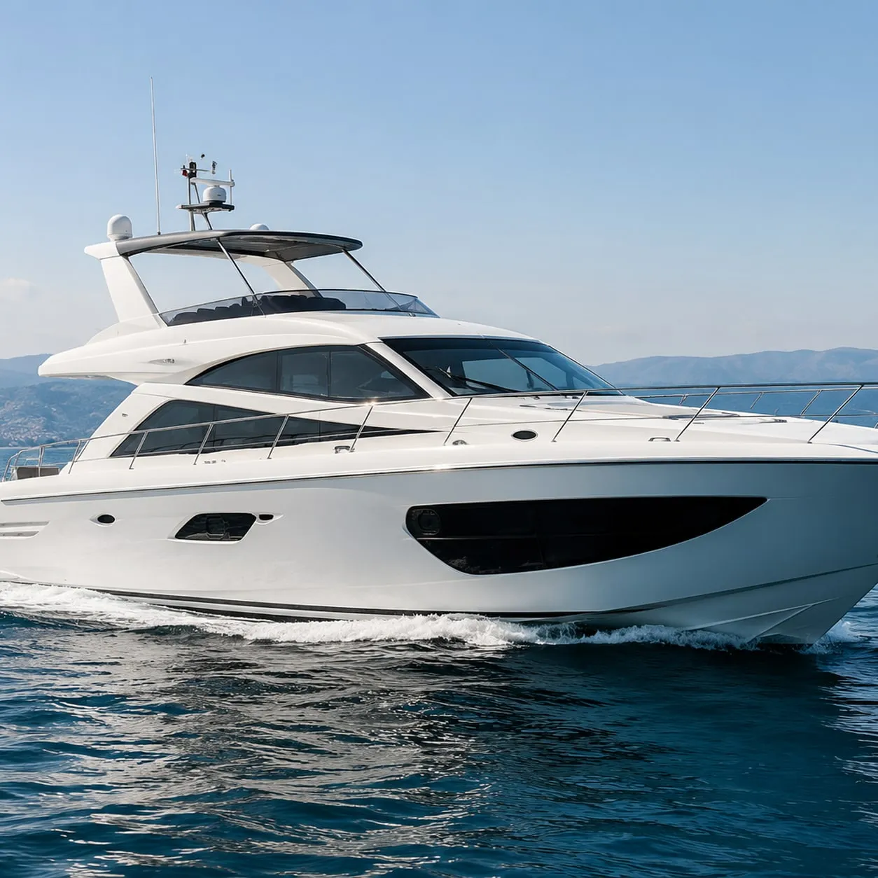 A white launch cruising on open water